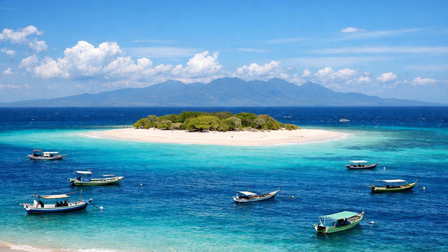 White sand island and turquoise sea at Tabuhan Island